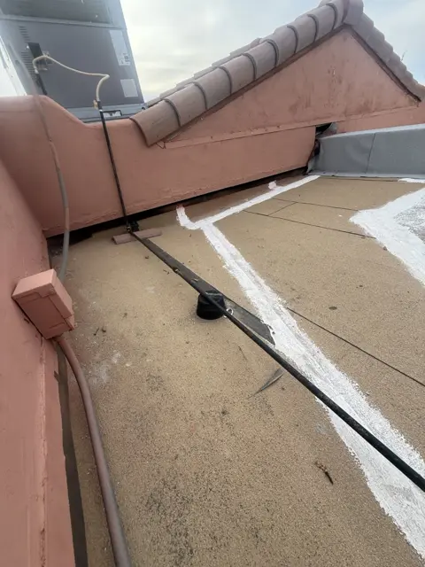 A roofline and equipment connection photographed during a service visit.