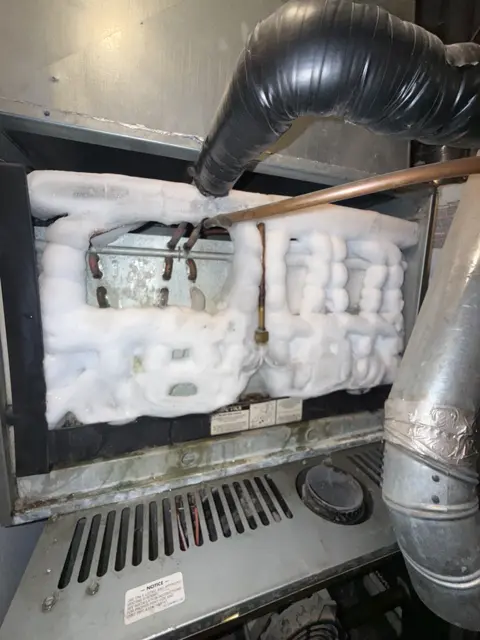 The interior coil compartment photographed with its access panel removed.