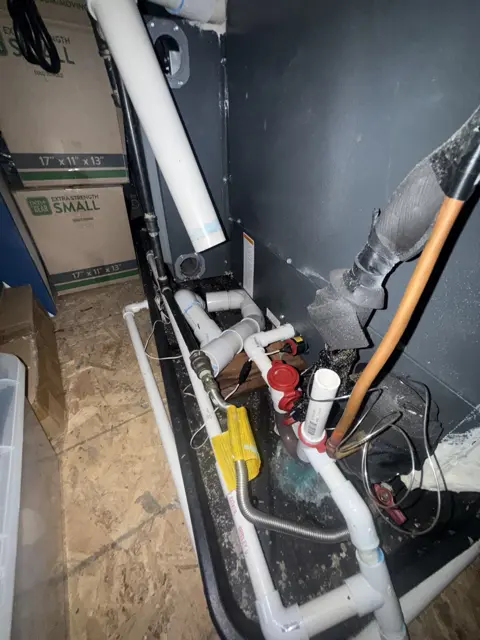 A closer view of condensate piping and equipment connections.